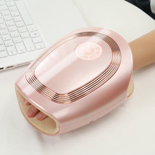 Dispositif de beauté et santé MainZen de Les Visionnaires, couleur rose, avec câble USB pour soins de la peau et relaxation.